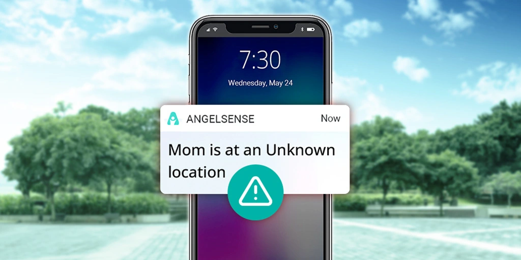 Alert from the AngelSense app on a smartphone showing "Mom is at an Unknown location,", emphasizing the importance of real-time location updates for ensuring the safety of individuals with dementia. 