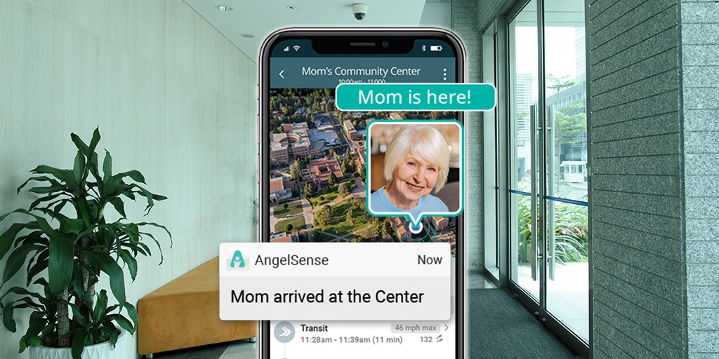 A smartphone displays the AngelSense app notification "Mom arrived at the Center," with a map background pinpointing mom's location, illustrating the app's utility in monitoring the whereabouts of loved ones with dementia.